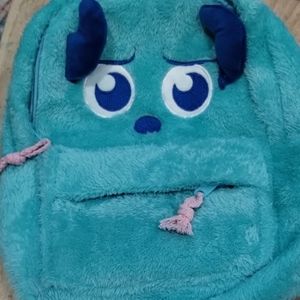 Teal Plush Backpack with Blue Accents